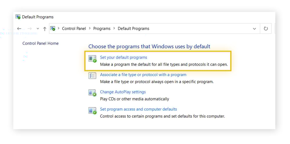 Captura de tela mostrando como acessar o menu "Definir seus programas padrão" no Painel de controle do Windows 10.