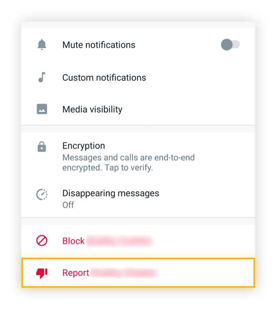 Reporting someone on WhatsApp.
