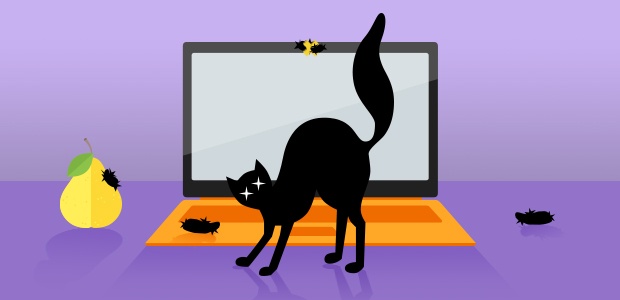 Black cat arching its back in front of a laptop with hairballs on the webcam and keyboard. Black cat arching its back in front of a laptop with hairballs on the webcam and keyboard.